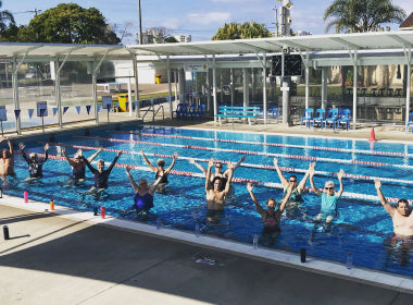 Group HIIT In The Swimming Pool